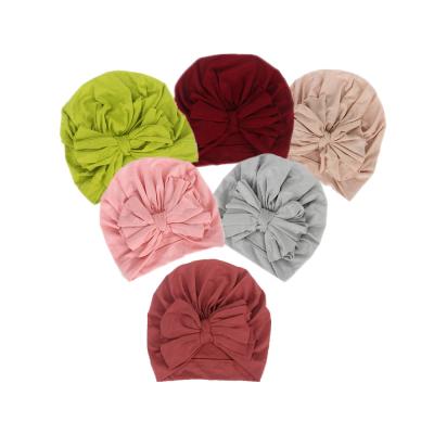 China Messy Picture Cotton Bow Baby Turban Hat Toddler Knot Bow Hat for sale