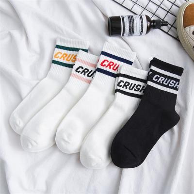 China Fashional cotton adult socks thongs women spring and summer korean style college cotton tube street sports English alphabet striped socks for sale