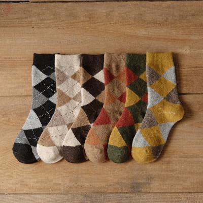 China Fashional adult cotton jars 2022 years of woolen socks new products personality Daling plaid ladies female tube socks spring hot and thick trend ins for sale