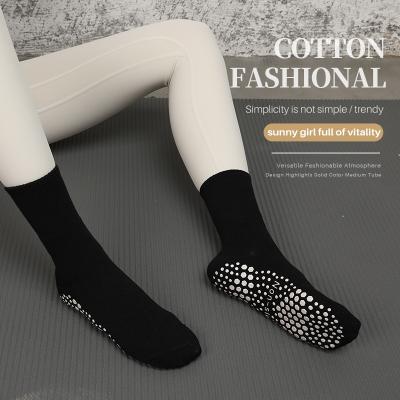 China Non-slip pilates socks tube professional women mid-tube handle socks logo pattern antibacterial strong custom indoor yoga socks long white soc for sale