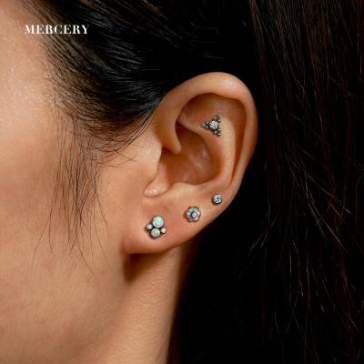 China Vintage Mercery 16G G23 Titanium Internally Threaded Top Zircon Group Labret Stud Cartilage Piercing Earring for sale