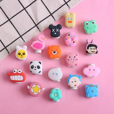 China High Quality Eco-friendly Universal Spiral Cartoon PVC Rubber Data Cable Cover Device Customized Data Cable Cover Device For iPhone for sale