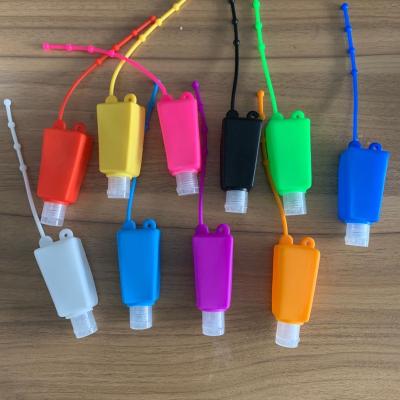 China 30ML Gel Color Trapezoid Hand Sanitizer Wholesale Pure Hand Sanitizer Silicone Bottle Holder Custom Made Bottle Holder for sale