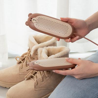 China Portable Electric Drying Shoes UV Light Shoe Dryer Support Customized USB Power Cardboard Style Brown Color Bear Thermostatic Shoes Dryer for sale