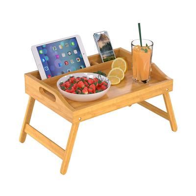 China Foldable Bed Tray Table with Handles Folding Legs, Bamboo Breakfast Food Tray with Media Slot for sale