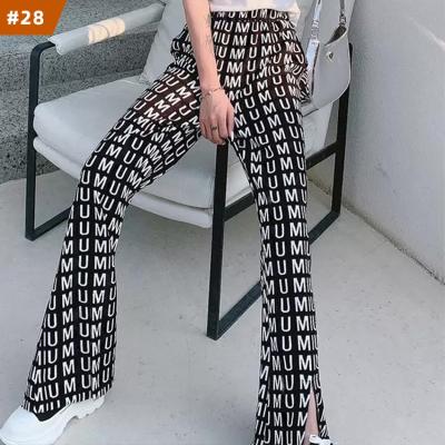 China 2022 QUICK DRY New Letter Printed Flared Wide Leg Pants Women High Waist Slit Pants Woman High Waisted Trousers Women for sale