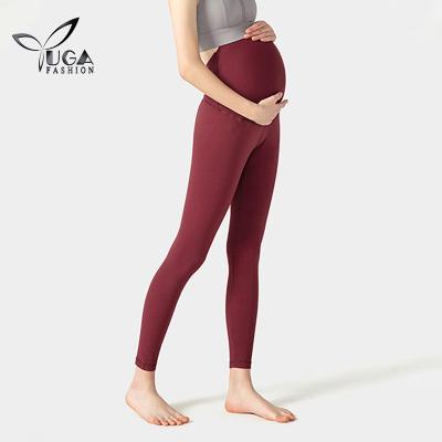 China New Fashion Pregnant Clothes High Elastic Solid Maternity Women High Waist Yoga Pants Warm Leggings for sale