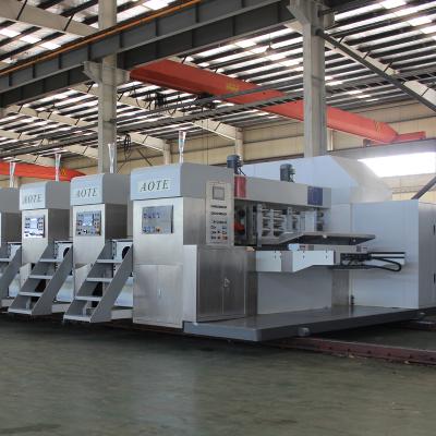 China Factory ZYKM IV (FIXED TYPE) HIGH SPEED FULLY AUTOMATIC PRINTING SLOTTING WITH CUTTING MACHINE for sale