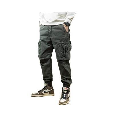 China Fashion Viable Street Casual Loose Multi Bag Tooling Jumpsuits Large Size Elastic Mens Trousers Pants for sale