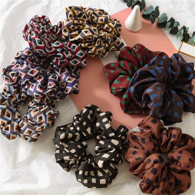 China Custom printed hair scrunchies women's style hair elastic band fabric scrunchies European and American wholesale hair ties accessories for sale