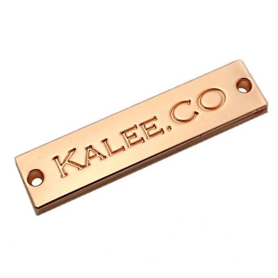 China Washable customized embossed foggy copper labels logo rectangle shape metal label for swimwear for sale