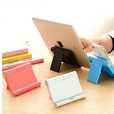 China Adjustable Creative Portable Universal Tablet Mobile Phone Folding Desk Stand Holder For Smart Phone for sale