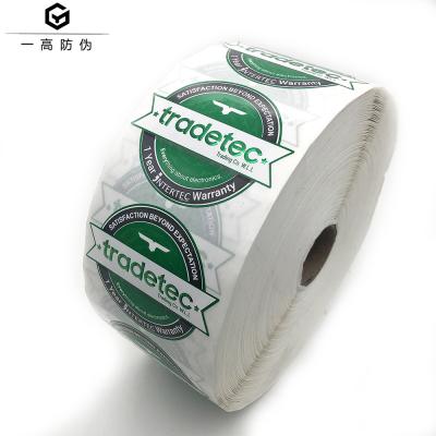 China 1 Inch Inner Core Anti-Counterfeit Roll Self Adhesive Sticker Green Foil Stamping Label With Embossed Text for sale