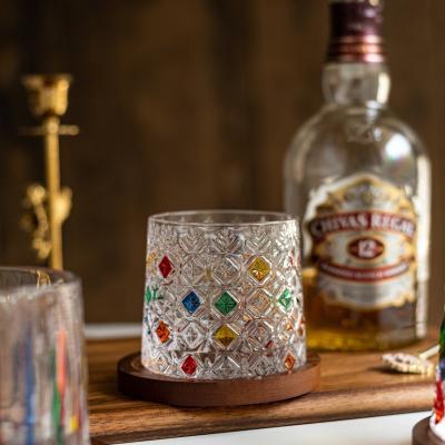 China Unique Romantic Hand Painted Home Drinks Rotary Glass Colored Whiskey Rotary Glass for sale