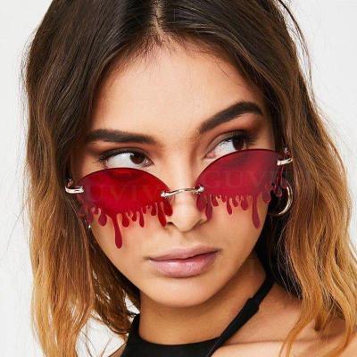 China Fashion Sunglasses 5330 Rimless Women Retro Teardrop Sunglasses Men High Fashion Frameless Steampunk Sunglasses for sale