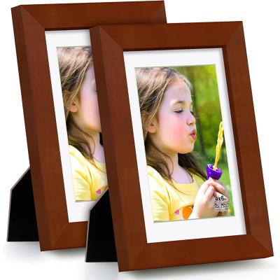 China Classic Style 4x6inch Brown Picture FramesMade Of Solid Wood And HD Display Glass 3.5x5 Photos With Mat For Table And Wall Mounting for sale