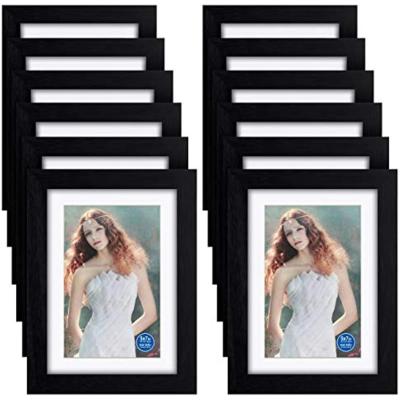 China 5x7 Inch Wood Picture Frames Made Of Solid Wood 4x6 Glass Photos And HD Display With Mat Or 5x7 Without Mat 12PK Black for sale