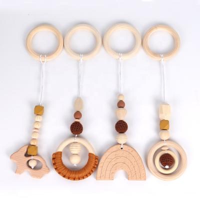 China Soft Toy Rainbow 4 Piece Set Beech Wooden Teether Pendant Baby Toy Rainbow Teether Toy Set For Kids Room for sale