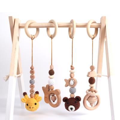 China 4pc/set soft hanging toy baby teether set wooden rattle baby teether wooden toys set for playing gym stroller beech wood teethers for sale