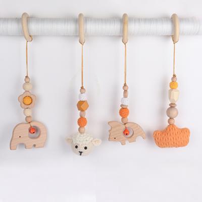 China Toy Pendants soft wooden teether toys baby rattle hanging custom wooden teether toys gift set wooden animal teether with packing gift box for sale