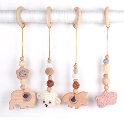 China Toy Hanging Beech Wood Baby Teether Rattle Baby Soft Toys Set Wooden Teether Custom Room Decoration Gifts Wooden Animal Set for sale