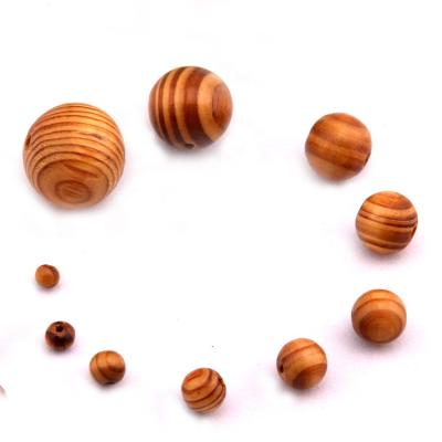 China China Manufacturer Hot Selling Safe Different Size 4mm-35mm Natural Unfinished Round Wooden Loose Spacer Beads Pine Wood Beads for sale