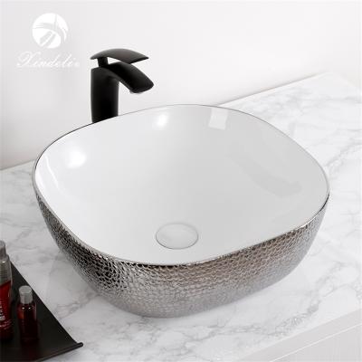 China Modern High Quality White Silver Bathroom Ceramic Plated Decorative Sink for sale