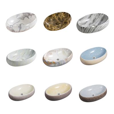 China Modern Hot Sales Above Counter Sink Ceramic Handmade Oval Marble Stone Wash Basin Sanitary Ware Basins for sale