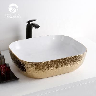 China Rectangular Modern Hot Sale Electroplate Gold Art Bathroom Designer Countertop Wash Basin for sale