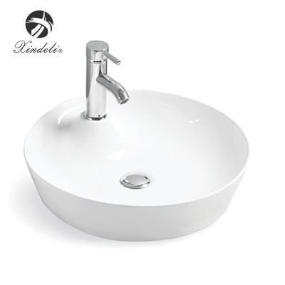 China Modern Design Single Hole Cheap Top XDL-D1306 White Round Above Counter Basin Art Bath Ceramic Sink for sale