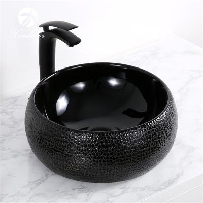 China Hot Selling Luxury Modern Mini Black Round Table Top Wash Basin Bathroom Sinks for sale