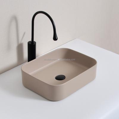 China Bathroom Modern Matte Beige Ceramic Wash Basin Manufacturer Sanitary Ware Rectangular Hotel Sink for sale