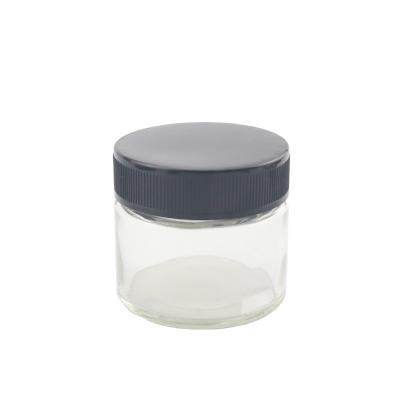 China Pharmaceutical Glass Jars Round Concentrate Container Packaging 5oz Custom Glass Jar With Child Resistant Lid for sale