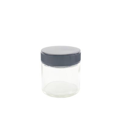 China Pharmaceutical Transparent Glass Jars 6OZ Oil Packaging Child Proof Glass Jars With CR Lid for sale