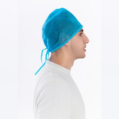 China Nonwoven Doctor Operation Surgeon Cap With Ties Doctor Head Cover Disposable SMS Surgical Hospital Wholesale Hat for sale