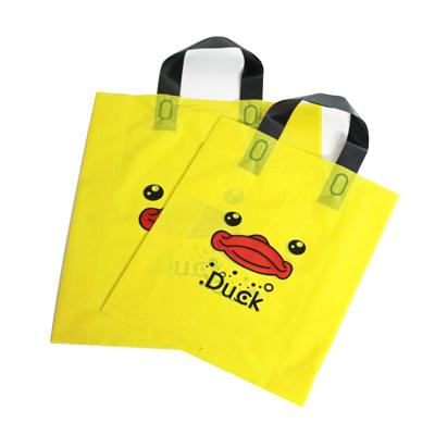 China Cheap Shock Resistance Wholesale Apparel Cosmetics Gift Packaging Bags Plastic Shopping Bags for sale