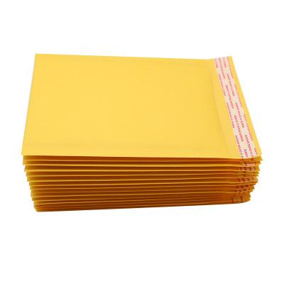 China Yellow Padded Bubble Envelope Mailing Bag Self-seal Yellow Kraft Paper Shipping Bag Custom Logo for sale