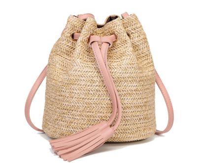 China 2020 Fashionable Environmental Friendly Handmade Straw Beach Bag Drawing Round Bucket Shoulder Bag for sale