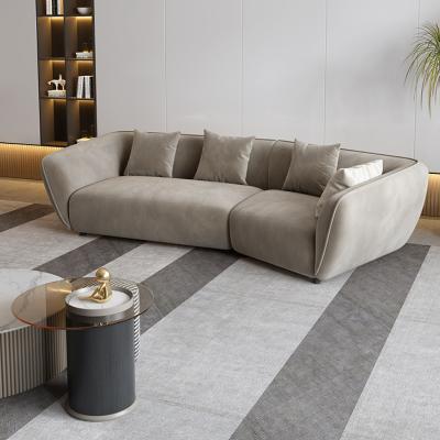 China Designer Furniture Luxury Cloth Sofa Italian Small Living Room Simple Modern Modular Arc Sponge Creative Sofa for sale