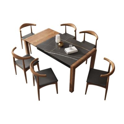 China Solid wood dining table simple solid wood dining table folding Nordic extendable rock and marble dish dining table chair combination for sale