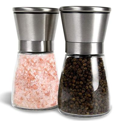 China Cooking Round Stainless Steel Bottle Manual Sea Salt Pepper Spice Grinder Top Grinding Glass Jar for sale