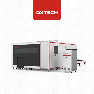 China 4 kw water cooled fiber laser with plate and metal sheet tube pipe fiber laser cutting machine 6000w dxtech for sale