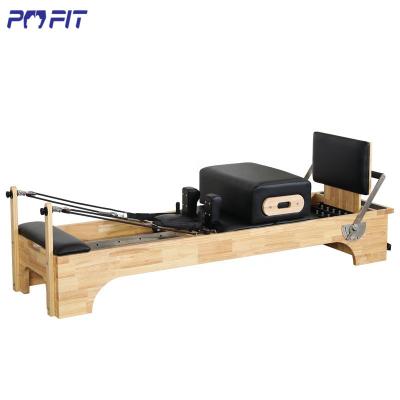 China Durable Wooden Reformer Pilates Folding Pilates Massage Bed Reformer Yoga Exercise Slide Pilates Core Bed for sale