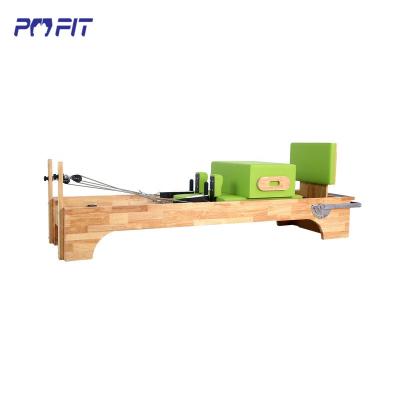 China Various Color Comfortable Pilates Reformer Trapeze Pilates Reformer Torre Core Half Body Reformer for sale