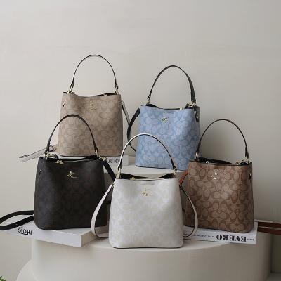 China Fashion Newest fashion 1:1 handbags coa luxury ch bucket bags women handbags designer handbags famous brands for sale