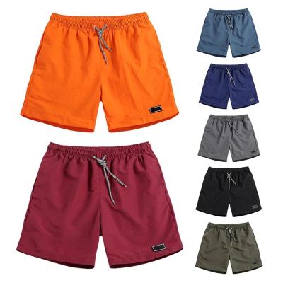 China Anti-wrinkle Men Casual Breathable Work Pants Pockets Beach Solid Color Sport Shorts Mens Short Jogger Shorts Pant With Breathable Pouch for sale