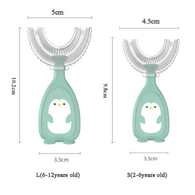 China Food grade silicone wholesale baby manual bpa silicone 360 ​​degree toothbrush cartoon penguin food grade infant oral cleaning for sale