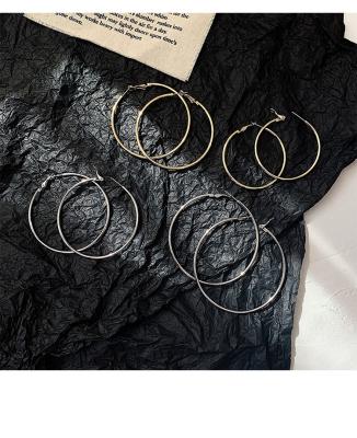 China Fashion Jewelry Cheap Wholesale Fashion Gold Stainless Steel Simple Exaggerated Circle Earrings Large For Women for sale