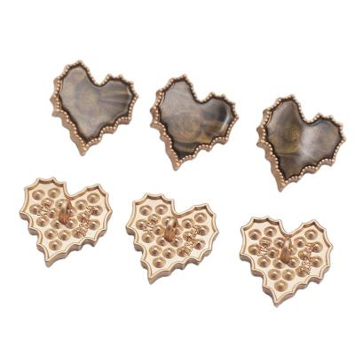 China Cost effective custom simple dry cleaning best quality factory pins love shape leg button gold leg buttons for apparel decoration for sale