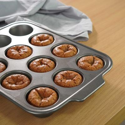 China Sustainable 12-Cavity 0.8 Mm Thiness Non-Stick Carbon Steel Large Mini Round Cupcake Pan for sale